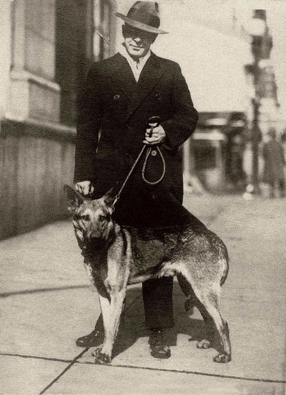 John Samuel Loder (Jack) c. late 20's-early 30's The photograph has the following caption: The dog, according to my mother, Elizabeth Loder Wallace (Betty), was Rin Tin Tin.