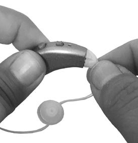 Gently twist the ear tube 1/4 turn and pull to remove from the hearing aid. Do not bend the ear tube & tip back and forth to remove it.