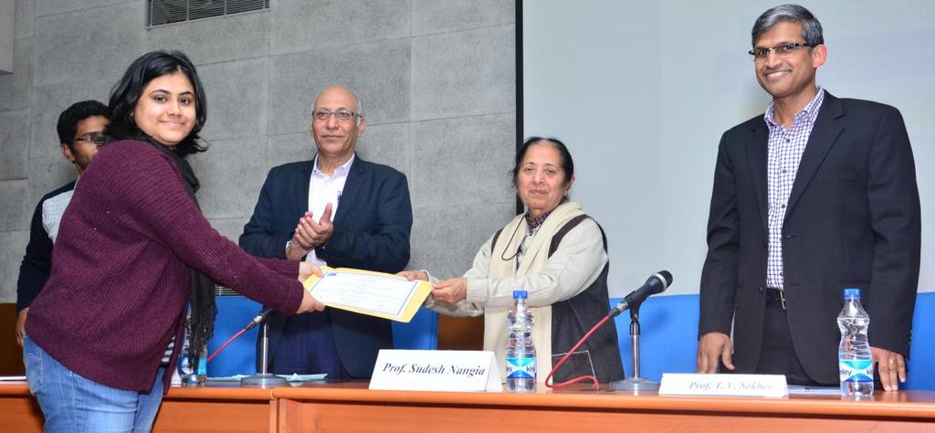 Ms. Shreya Banerjee receiving the best poster award from Prof.