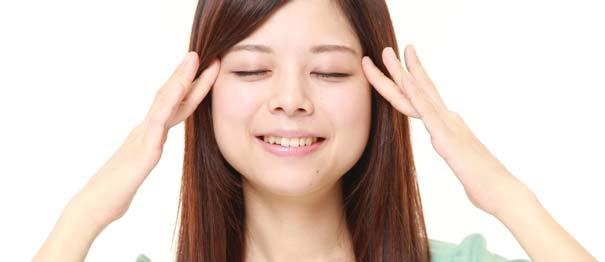Still in a massaging motion, bring fingers towards ears and then use fingers to massage ears, gently pulling down on earlobes as you massage.