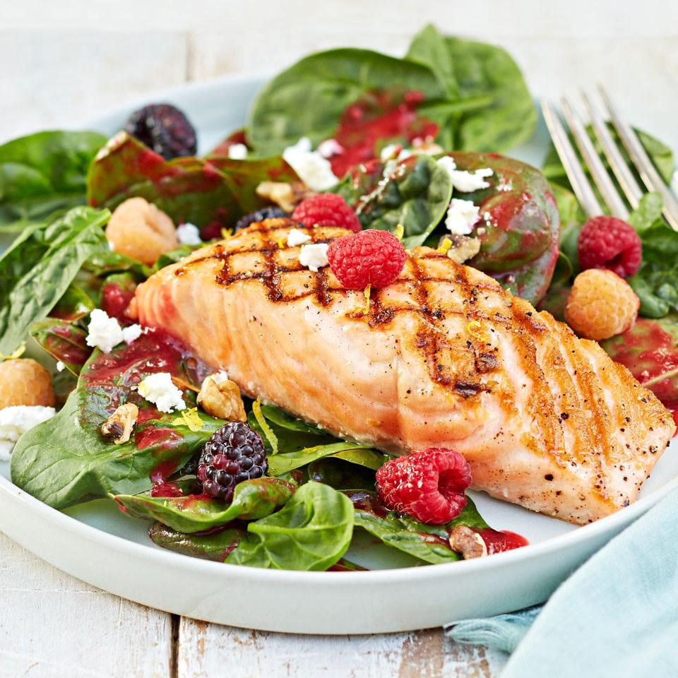Grilled Salmon Salad with Raspberry Vinaigrette Serving size: 1 salmon fillet + 2 cups salad Per serving: 325 calories; 14 g fat(3 g sat); 10 g fiber; 21 g carbohydrates; 29 g protein; 67 mg
