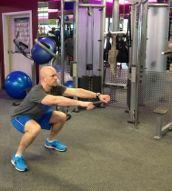 Warm-Up Bodyweight Squat Stand with your feet just greater than shoulder-width apart.