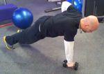 braced Complete a DB Row, maintaining a straight line with your body.
