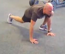 Start in the top of the pushup position. 2.