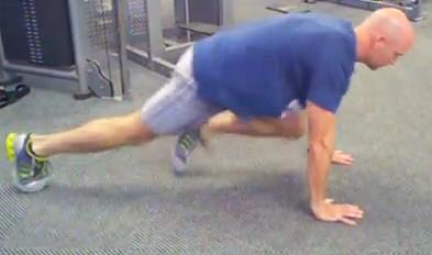 Mountain Climbers 1. Brace your abs. Start in the top of the push-up position. 2.
