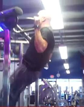 swinging (they will swing a little from the momentum) 4. Pull your chest up to the bar.