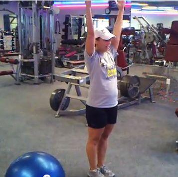 Alternating TD Reverse Lunge Stand with your arms extended above your head