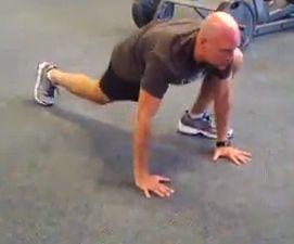 Start in the top of the pushup position.