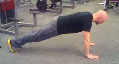 T-Pushup Keep the abs braced and body in a straight line from toes to