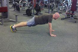 Lower into a pushup position, but halfway down pause for one second.