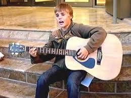 Made a YouTube account on January 15, 2007 (account name is Kidrauhl) Entered a local singing competition in Stratford and came in second place Spent his days busking in front of the Stratford Avon