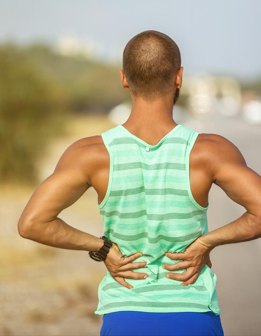 Exercise-related Low Back Pain Lower back pain can occur as a result of movement patterns used during running Contributing factors: - Excessive forward tilt of the
