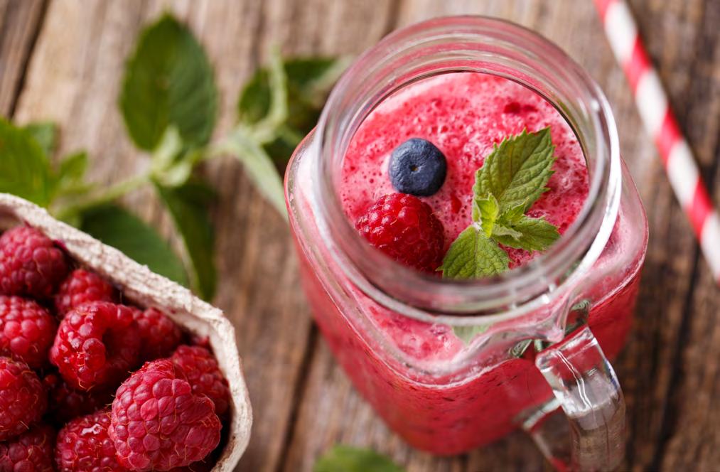 THE REFRESHER Serves 4 1 cup raspberries 1 cup blueberries 2 cups almond milk, unsweetened 4 medium bananas, peeled, frozen, chunks 16 ice cubes 4 inches cucumber 3