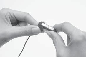 Wearing your processor Attaching and detaching the LiteWear Cable To attach the LiteWear Cable: 1. If the battery module is attached to the processing unit, detach it from the processing unit. 2.