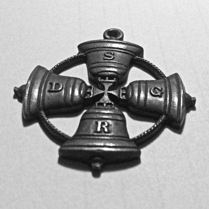 belonged to including one small bronze badge with a design of four bells and the letters SDGR.
