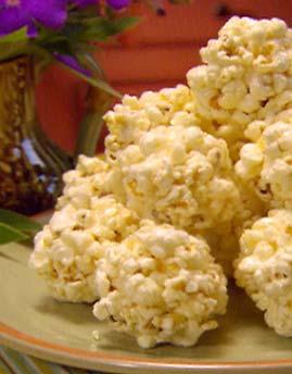 Holiday Calorie Quiz How many calories in one popcorn ball? A. Less than 50 calories B.
