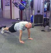 Workout C Modified Burpee Stand with your feet shoulder-width apart.