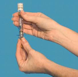 5. Air bubbles can be removed by gently tapping the syringe.