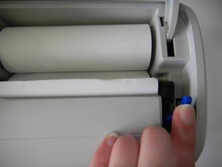 it by rotating the printer roll with your finger (Figure