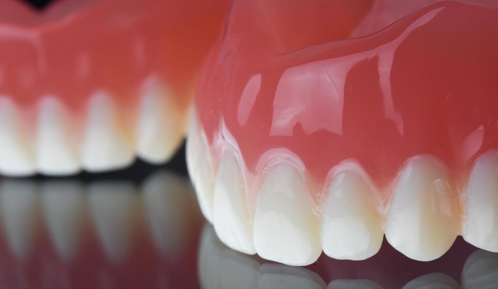 The dentures were printed in office using Envision Tec Vida and Next Dent