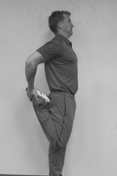 Quad Stretch (Quadriceps) Stand with feet shoulder width apart and bend knee and grasp ankle with hand
