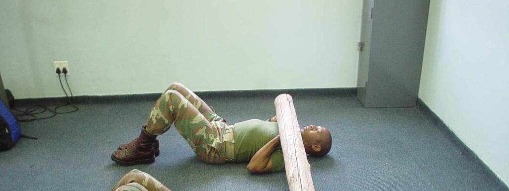 Lie in a sit up position.