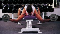 Maintain a slight bend in your elbows.keep your hips and shoulders flat on the bench, and your feet flat on the floor.
