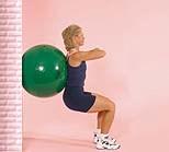 Lower body down into a squat position (do not bend knees passed 90 approximately chair