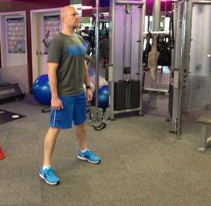 Workout B Bodyweight Squat Stand with your feet just greater than shoulder-width apart.