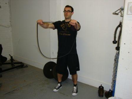 Workout B Band Pull Hold a resistance band with your hands spaced shoulder width apart.