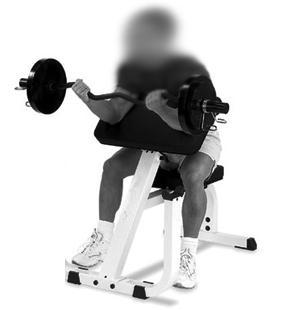 EXAMPLE EXERCISES Barbell Preacher Curls As shown, sit on the preacher curl bench and use a curl bar with both hands, palms up. Simply curl the bar up toward your chin.