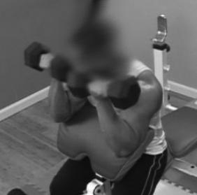 Using an overhand grip, simply curl the bar up toward your chin. Slowly return to the start position. Repeat.