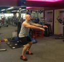 Bodyweight Triple Squat Stand with your feet just greater than shoulder-width
