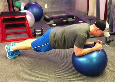 Stability Ball Plank Brace your abs.