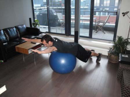 W Exercise Descriptions Warm Up Lie on your chest on a ball and stick your arms out in front of you at a slight angle