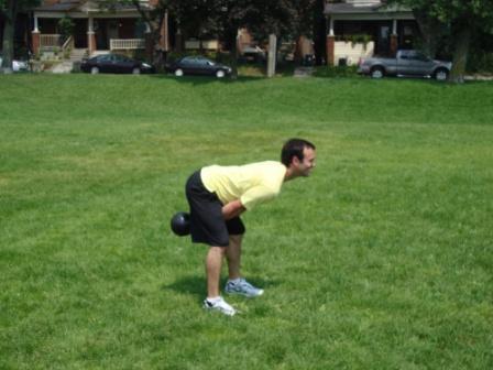 Day 1 Workout A Chicken Leg Shake n Bake KB Swing Stand with your feet wider than shoulder-width apart.