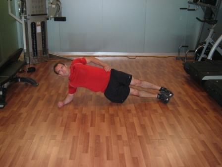 Day 1 Workout A Chicken Leg Shake n Bake Side Plank Lie on a mat on your right side. Support your bodyweight with your knees and on your right elbow.