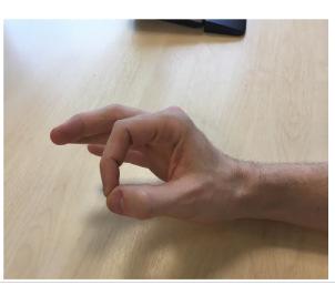 Thumb opposition Touch tip of thumb to tip of index finger to form an O. Hold this position for 3 seconds, then let go. Repeat 10 times.