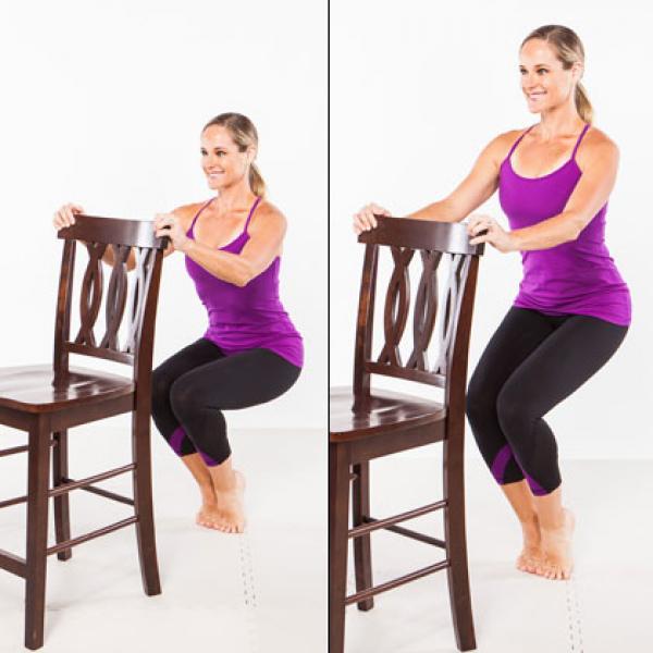 Stand straight with a chair in front of you, Lift up your body on your toes with the toes bend at 45 degrees while resting your hands on the back of the chair, now bend your knees out and lower