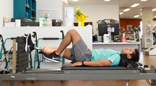 Leg press on reformer with prosthesis Lie on your back with your prosthetic foot on the