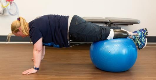 Pike with fit ball Start in plank position with your legs over