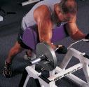 The Exercise: Curl the barbell upward in an arc. As you begin, be careful not to lurch or rock the weight to get it moving.