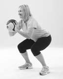 As technique improves, accelerate out of the squat, jump up and throw the MEDICINE BALL as high an you can in front of you.