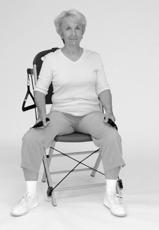 Wrap lower right cable under both thighs and hold handle against top of left thigh. () 3. Slide right leg to the side of the chair as shown. () 4. Slowly return to starting position. 5.