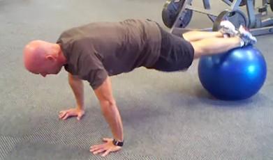 Workout B Stability Ball Jackknife-Pushup Brace your abs.