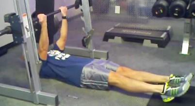 Inverted Row Set a bar at hip height in the smith machine or squat rack.