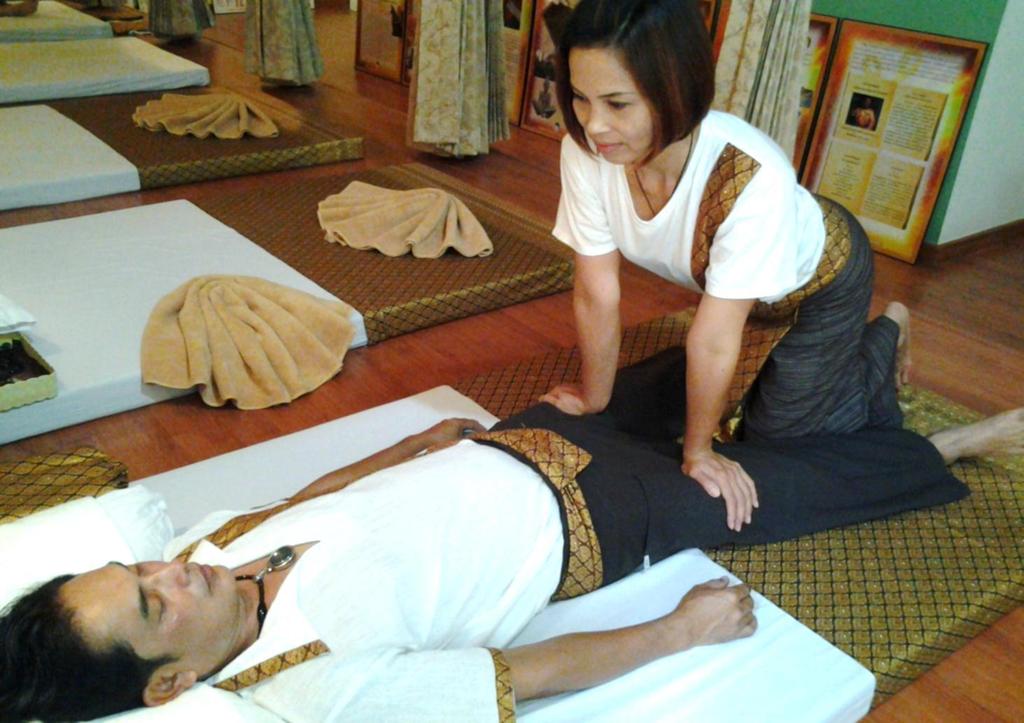 Preparation The massage recipient changes into loose,