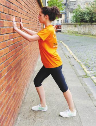 Calf stretch 1. Stand approximately arms-length away from a wall, with feet shoulder-width apart 2. Place hands against the wall, shoulder-width apart with your arms straight 3.