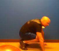 Lower into a pushup position, but halfway down