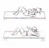 Lying on a flat surface, face up, bend both knees keeping feet on the ground.